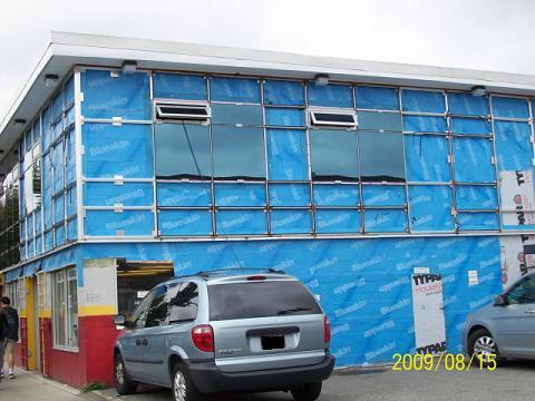 Side of the building showing support grid and
water proofing covering. 